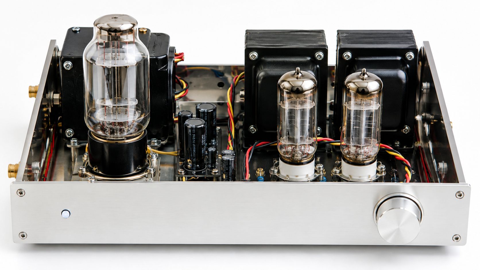 A view of the internal components of a stereo tube amplifier with three vacuum tubes and transformers.